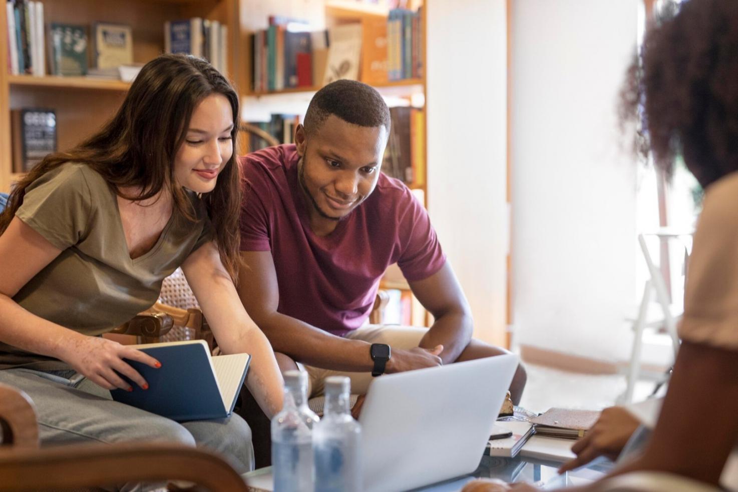 Laptop displaying financial dashboard with charts and graphs