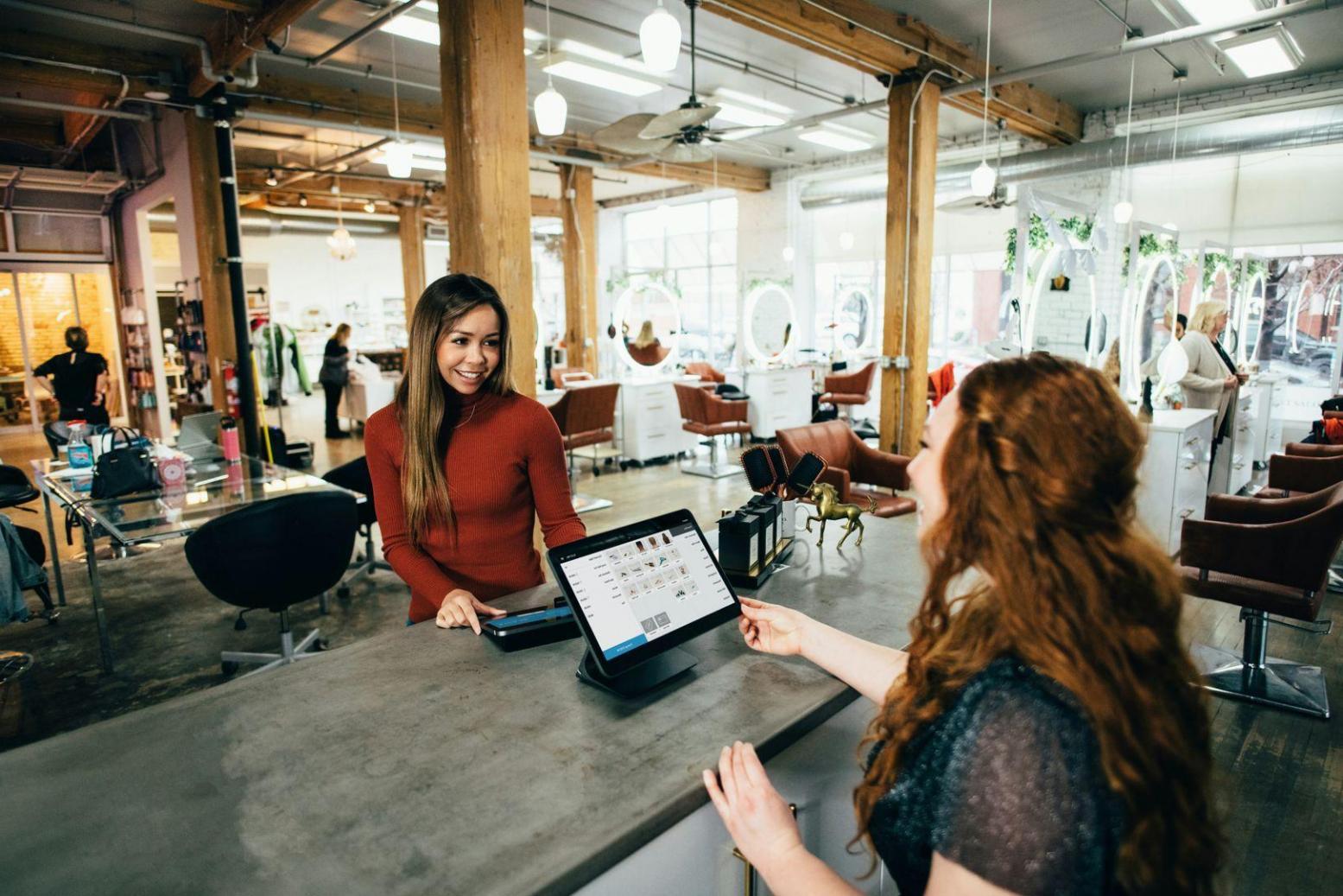 Financial planning workspace with budget sheets, calculator and coffee cup