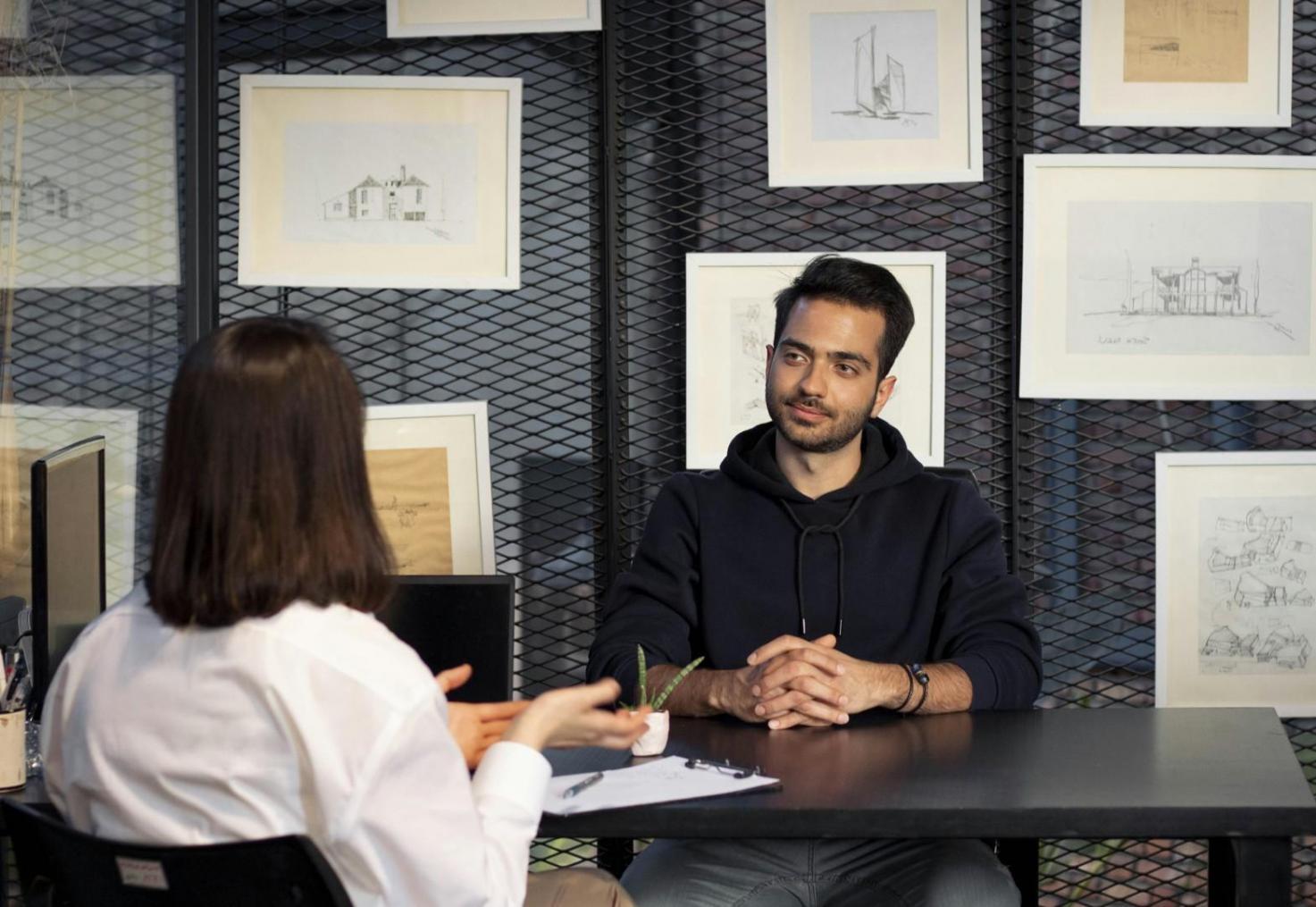 Financial planning consultation workspace with calculator and documents